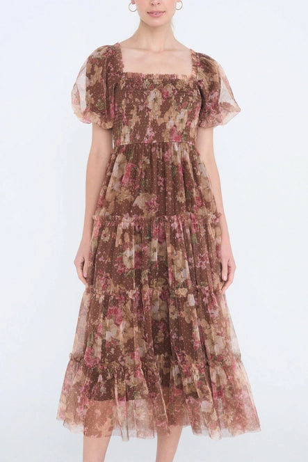 The Autumn Enchanted Orchard Tiered Tulle Midi Dress in a brown floral pattern with sheer puff sleeves, square neckline, and tiered midi skirt.
